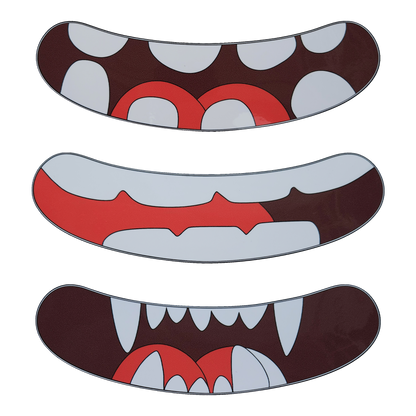 3 different styles of teeth stickers for the Ldb Ledback buddy Smart LED Backpack. One with rounded teeth, one with flat teeth, and one with pointy teeth with long fangs, all with visible tongues. The Teeth stickers can be applied to a specific smiling-mouth shaped section on the outside of the hardcase Ledback Buddy Bag.