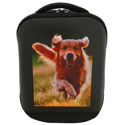 Black Ldb Ledback HD Smart LED Laptop Backpack with the LED screen displaying a picture of a golden retriever running through a sunny field, viewed from the front isolated on a transparent background.